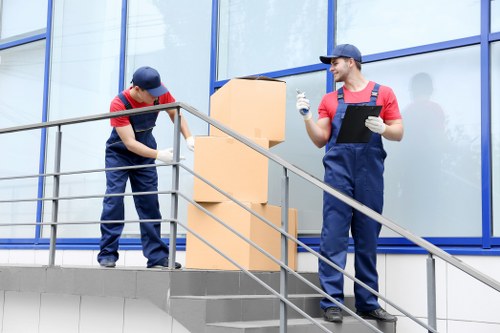 Careful loading of home belongings for a move in central London