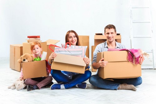 Professional movers handling household furniture in Marylebone